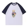 T-shirt a maniche corte in cotone puro con un design unico con stampe animali, polo traspirante e confortevole oversize, un nuovo oggetto di moda appena lanciato.