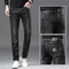 Men's Jeans Designer 2023 Automne / hiver Nouvelle marque de mode européenne pour hommes et jeunes édition coréenne Slim Fit Small Feet Elastic Broidered Black Pants 8pn0