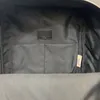 Sac à dos de sacs à dos de concepteur de bacs Womans Sacs à main unisexe Classic Sac à main noir Signe Metal Zipper High Quality Multi Pockets Schoolbag