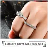 Con pietre laterali Shuangr Fashion Silver Coloy Couple Rings 2 Pcs Cryccon Crystal Set Uomini Bague di gioielleria da sposa