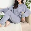 Vêtements de nuit pour femmes 2 pcs / ensembles de pyjamas pour femmes ensembles de couleur solide lâche manches longues rond coule endormi aux vêtements de maison décontractés décontractés