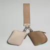 Keychains Lanyards Designer merk metaal met een dubbele zak polsbekel pochette dubbele riem waterdichte mini yoga tas afneembare sleutelketen