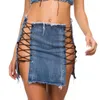 Jupes 2024 Été noir creux out denim mini vêtements pour femmes sexy club bodycon lace up fêtard femme courte jupe crayon os276