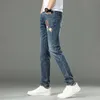 Designer di jeans maschile 2022 Luce luce europea europea jeans elastico per leisure slim fit flower floer primavera e estate nuovo stile NW44