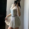 Women's high quality designer suit spring/summer round neck knitted slim short sleeve T-shirt Women's pleated skirt casual suit two-piece set