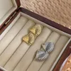 Boucles d'oreilles en peluche vintage gold coque en métal coulé étalon minimaliste pour les femmes bijoux de boucle d'oreille punk en gros bijoux 2024