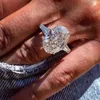 2022 Anéis de casamento mais vendidos Jóias de luxo brilhantes 925 Sterling Silver Lagre Oval Corte Branco Topaz Cz Diamond Gemtones Party ETE172H