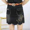 Skirts Summer 2024 Exquisite Rhinestone Frayed Fringe Short Denim Skirt Women's Vintage Beaded Design Girl A-line Hip