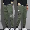 Pantalon masculin Classic Strtwear Casual Men Ribbons Harem Jogging Pantalging Male Slim Fit Spring Cargo Pantal