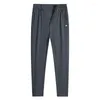 Pantalon masculin baisheng printemps et automne simple fat guy pieds