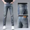 Jeans masculino Designer 2024 Marca de ponta primavera/verão Novo lazer Slim Fit Fit Fit Fit Fit Foot Bordado Elástico Bordado Estilo Thin 44S3