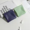 Väskor 1st Portable Pu Leather Coin Purse Earphone Bag Headphone Organizer Mini Sundry Cosmetic Bag Female Lipstick Change Storage Bag