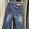 Jeans para mujeres 2024 Correa de cintura alta de otoño Correa de envoltura apretada de la cadera Pantalones de mezclilla delgado Micro Born