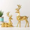 Dekorativa föremål Nordiska julreindefigur Geometriskt harts som sitter stående älghjortstaty för hemmakontorsdekoration 2 st