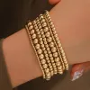 Armreifen handgefertigte Goldfarbe Perlen Armbänder Set 7 PCs Stretch Women Trendy Armbänder Vintage Girls Party Boho Juwely