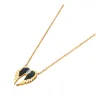 Colliers Lokaer 18K Gold plaqué en acier inoxydable Double Ailes Collier Collier Bohême Style CZ Crystal Pendant pour les femmes N21198