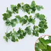 Dekorative Blumen 2pcs künstlich grünes Grün Pflanzen Gefälschte Efeu Girlandblätter Dekoration für Hochzeit Kulissenbogen Hausgarten Wanddekoration