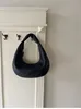 2024 Spring Khaite Crescent Moon Bag: Luxe echte lederen knoedel Tote - Designer Fashion voor vrouwen, minimalistische textureerde lederen handtas zwart