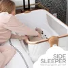 Koolerthings Baby Bassinet Beder Sleeper مع سلة تخزين للحديدين - سرير محمول سهل طي مع مرتبة مريحة وحقيبة سفر متضمنة