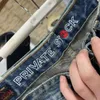 Fushen broderad tvättade mäns raka lilla röda m haiou modemärke japanska casual jeans 429304