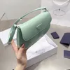 Luxurys Designers Sacs pour femmes en cuir en nylon sac en cuir en cuir en nylon sac à main en métal élégant sac à main