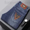 Heren jeans ontwerper 2022 Luxe Europese high -end vrijetijdsschilfer Slim Fit Small Foot Elastisch katoen borduurwerk Merk herfst en winter nieuwe TRBF