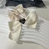 Мода Женские Женщины Дизайн бренда с двойной буквы Crystal Pearl Hair Rubber Rubber Elastic Hairrop