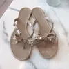 Flip Flops Summer Beach Shoes Rivets sandali a fiocchi Nuovo Fashio Europe States Designer Designer Scarpe da donna Sandali