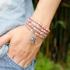 Strängar 6mm naturliga Rhodochrosite Pärlor Strand Armband Women Lotus om Buddha Charm Yoga Armband 108 Mala Necklace Yoga smycken