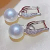 Dingle ljuskrona trend imitation pärla örhänge för kvinnor lyx silver färg bling kubik zirkoniummode eleganta smycken h240423