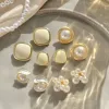 Earrings WENHQ Hot Sale Gold Color Clip on Earrings Fashion Enamel Pearl Fake Piercing Ear Cuff Earrings Cute Butterfly Flower Ear Clip