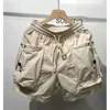 السراويل القصيرة السائبة Harajuku Streetwear Multi-Pocket Fashion Shorts Quick Dry Outdoor Litness Shorts عالية الجودة 240423