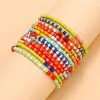 Armreifen 12pcs/Set handgefertigte farbenfrohe Perlen Armbänder für Frauen farbenfrohe ethnische Afrika -Perlen Armbänder BOHO BRAKLETS Accessoires Mädchen Mädchen