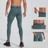 Pantalon masculin arrage serré séchage rapide poches intégrées leggings élastiques à la monnaie de fitness pantalon baggy