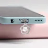 Ponga di polvere per cellulare Gadgets antidust del telefono cellulare intarsiata con fiore di gemma diamante alla moda e bellissima tappo di polvere di polvere di gioielli in lega Y240423