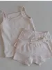 Set di abbigliamento 2024 Nuova bambina Summer Simplettles Shot Set Set infantile top con fionda solide + pantaloncini 2 pezzi Suit di cotone per ragazzi per ragazzi H240423