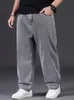 Ogabaniowe dżinsy mężczyźni wiosna jesienna swobodne luźne spodnie dżinsowe w rozmiarze szerokie nogi elastyczna talia ubrania do spodni dla grubego człowieka 240421