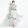 Butique damskie sukienki z nadrukiem krótki rękaw Summer duży huśtawka High-end Temperament Lady Ruffles Kwiatowe sukienki na wybiegu sukienki