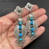 Chandelier en pente ethnique rond incrusté de boucles d'oreilles en pierre bleue pour femmes couleurs argentées vintage motif spirale de sculpture h240423