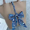 حقيبة حمل حقيقية الجلد 22 جديدًا جديدًا من سلسلة Junma Cloak Twill Bag Bag Bag Bag Bag Hight Right Long Hair Strap Family Strap Small Fluff Strap