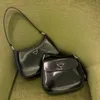 Projektanci torebki pod pachami ramionami Wysokiej jakości projektant Crossbody błyszcząca skórzana torebka hobo topy sprzęgła Messenger for Women Fashion Crescent Bag 2024