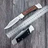 110 Tactical Pocket Folding Hunter Knife D2 Blade G10/trähandtag utomhus camping knivar Taktiskt EDC -verktyg med läderhölje
