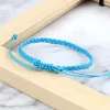 Bracelet de corde à cire imperméable aux brins pour femmes hommes artisanaux bracelet bouddhiste tibétain tibétain amitié