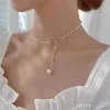 Klipsy ładne naszyjnik z muszką perłowy Rhinestone Pearl Pearl Naszyjnik dla kobiet DeLited Collarbone Minimalist Choker