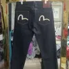 Fujia Men's Alphabet Curled Edge Original Cow Jeans、赤い耳の刺繍と印刷されたバックバッグ718555