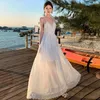 Casual klänningar sexig rygglös strandsemester vit lång klänning för kvinnor sommar ärmlös designer ihålig ut spaghettirem
