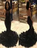 2020 Black Bched Halter Lace Sirène Long Robes de bal Illusion Tulle Applique des couches de plumes perlées BC1273893776