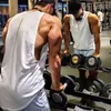 Summer sin mangas Top Men Muscle Tshirt Sporting Gym Gymwing Mens Fitness Fitness White Tops Man DeBardeur Hommes 240412