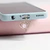 Cell Phone Anti-Dust Gadgets Mobile phone dust plug love dolphin pearl fashionable alloy inlaid diamond pendant jewelry Y240423