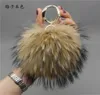 Luksusowa marka 15 cm prawdziwy lis pomp pomp pompom Ball Wysoka jakość klucza klucza metalowego wisiorka dla kobiet F281 2104094697886